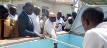 Mayuge RDC, Lt. Hajji Walugembe Aramandhani, officially commissions the solar-powered water supply system in Mitimito village (November 2025).